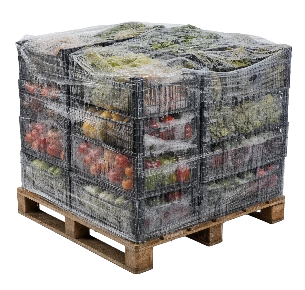 A skid of products with fruits and vegetables that has a build up of condensation. 